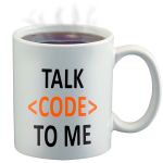 Coffee mug with words Talk Code to Me written on the side