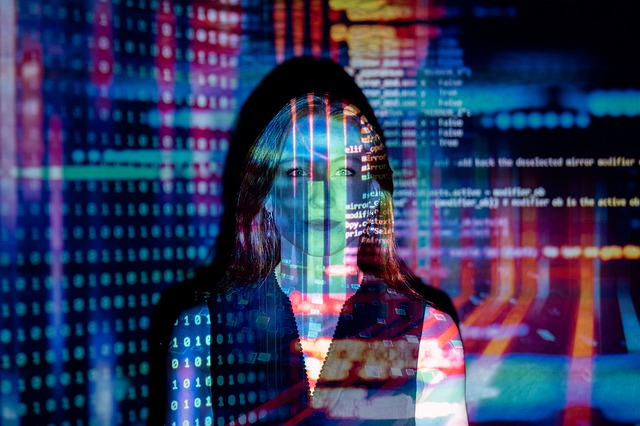Code appears overlaid a picture of a software engineer's face