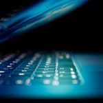 Keyboard of laptop photographed from the side and close up