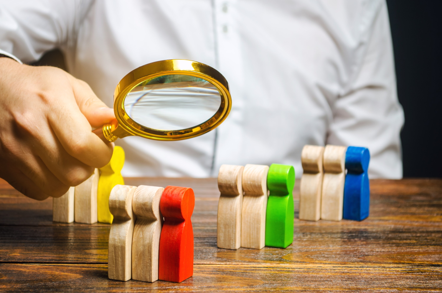 Custom CRM customer relationships shown with wooden people