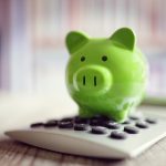 BSPOKE Software - Piggy bank and calculator to represent custom software budget