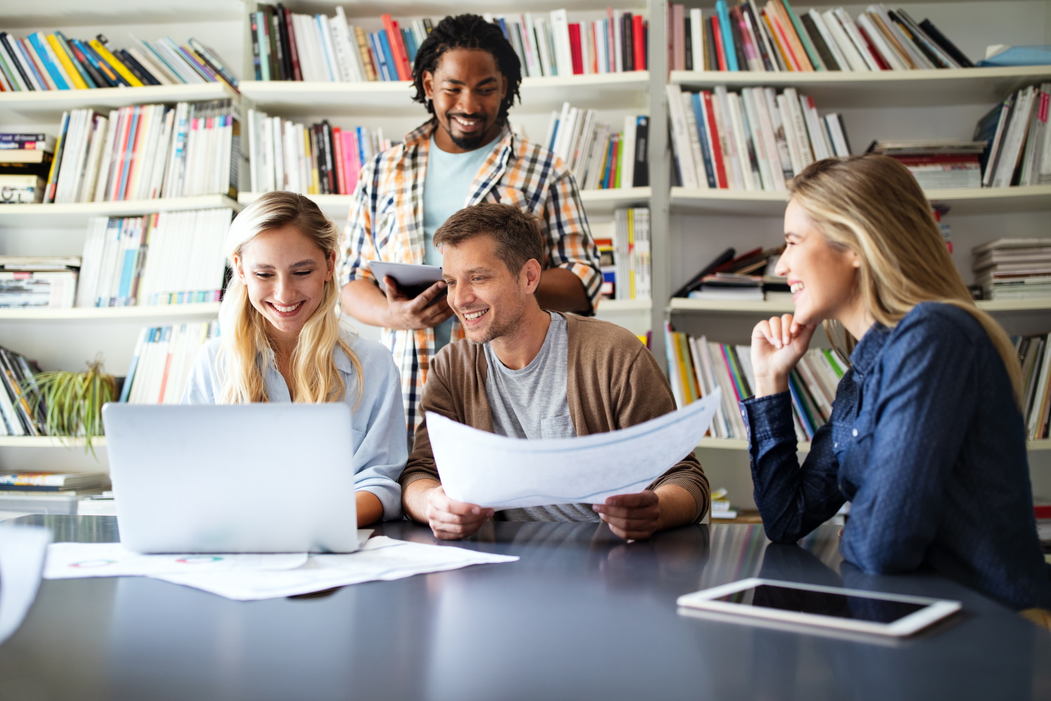 Group of software developers with clients