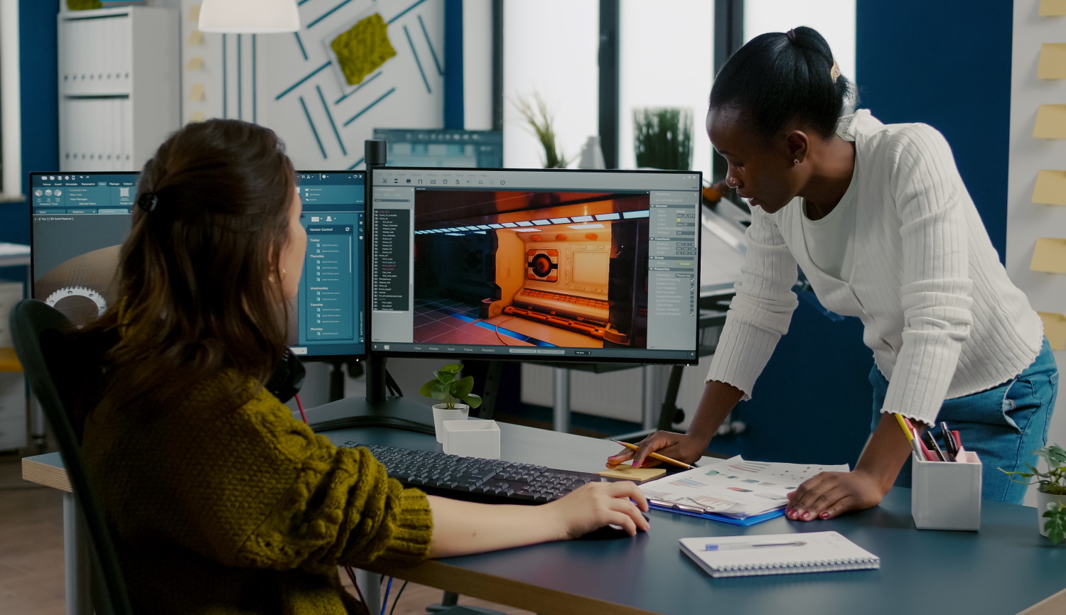 BSPOKE Software - Shows two developers testing custom software for a business project