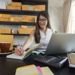 BSPOKE Software - Retail online office with girl working on computer using bespoke software for a retail business
