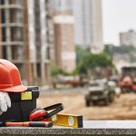 BSPOKE Software - Construction site with health and safety equipment,with regards to useing custom software to monitor buiness helt and safety issues.