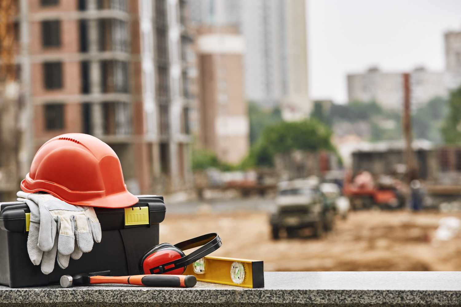 BSPOKE Software - Construction site with health and safety equipment,with regards to useing custom software to monitor buiness helt and safety issues.
