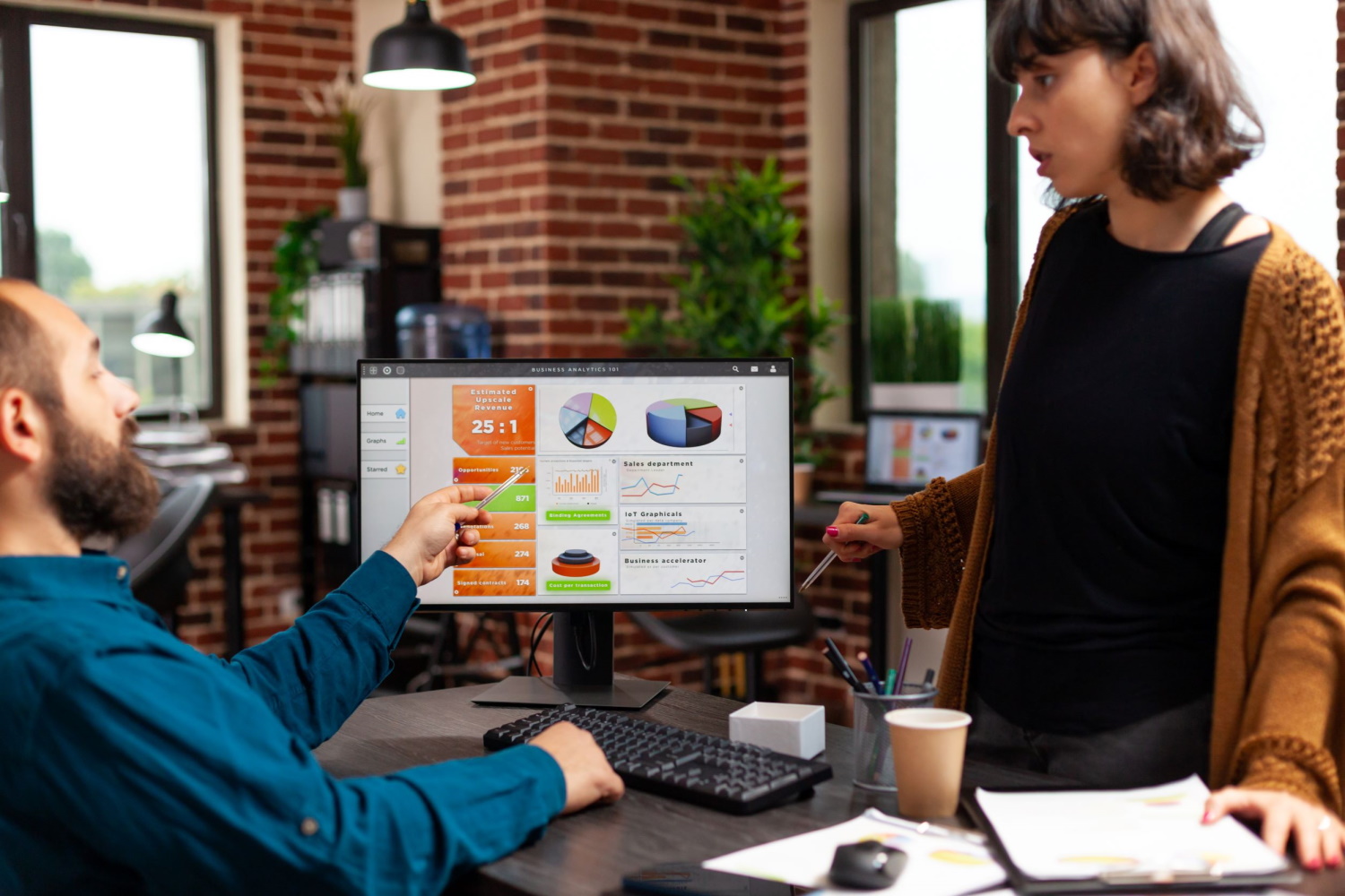 BSPOKE Software - Developers discussing key performance indicators in software development
