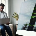 BSPOKE software - custom software consultant studying the development analysis phase of a bespoke software project